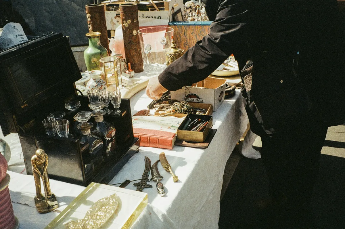 A table of donated items laid out for bidding